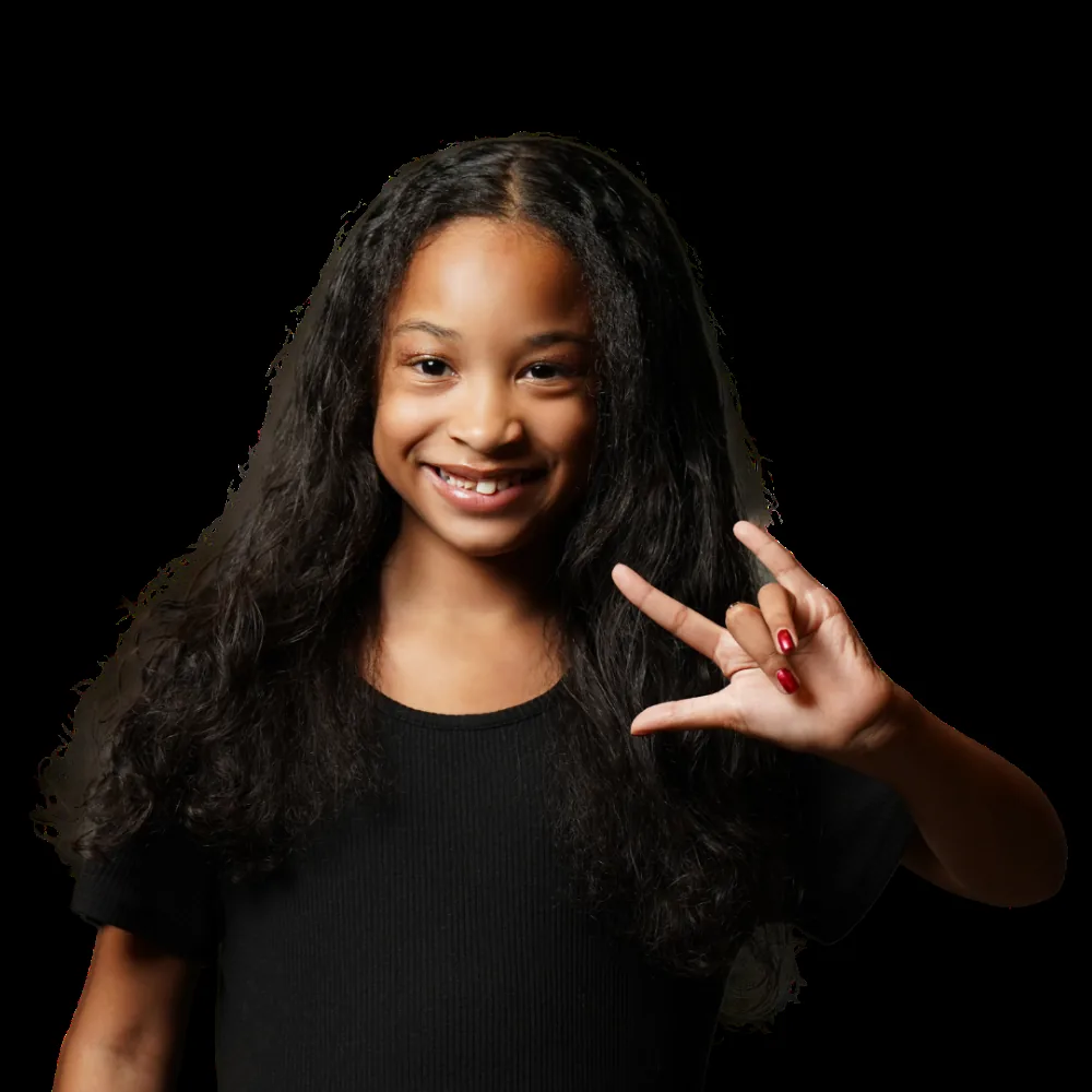 An ASL Choir student signing